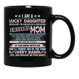 I'M A Lucky Daughter Because I'M Raised By A Freaking Awesome Mom Black Coffee Mug - Black