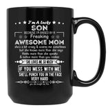 I'M A Lucky Son Because I'M Raised By A Freaking Awesome Mom (10) Black Coffee Mug - Black