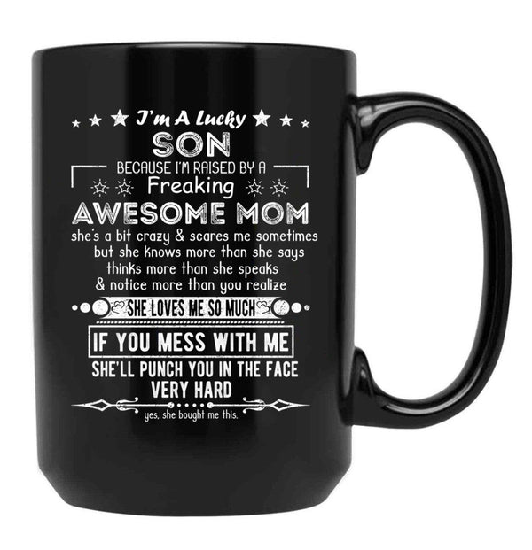 I'M A Lucky Son Because I'M Raised By A Freaking Awesome Mom (10) Black Coffee Mug - Black