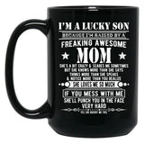 I'M A Lucky Son Because I'M Raised By A Freaking Awesome Mom (1) Black Coffee Mug
