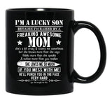 I'M A Lucky Son Because I'M Raised By A Freaking Awesome Mom (5) Black Coffee Mug - Black