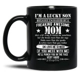 I'M A Lucky Son Because I'M Raised By A Freaking Awesome Mom (5) Black Coffee Mug