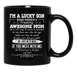 I'M A Lucky Son Because I'M Raised By A Freaking Awesome Mom (8) Black Coffee Mug - Black