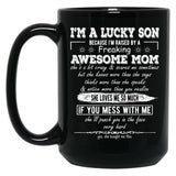 I'M A Lucky Son Because I'M Raised By A Freaking Awesome Mom (8) Black Coffee Mug
