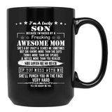I'M A Lucky Son Because I'M Raised By A Freaking Awesome Mom (9) Black Coffee Mug - Black
