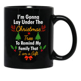 I'M Gonna Lay Under The Christmas Tree To Remind My Family That I Am A Gift Funny Christmas Gift Black Coffee Mug - Black