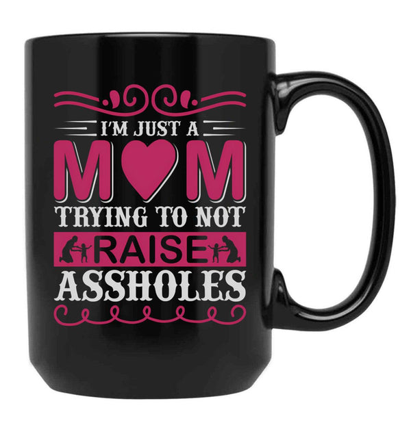 I'M Just A Mom Trying To Not Raise Assholes Black Coffee Mug - Black