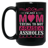 I'M Just A Mom Trying To Not Raise Assholes Black Coffee Mug