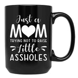 Just A Mom Trying Not To Raise Little Assholes Black Coffee Mug - Black