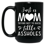 Just A Mom Trying Not To Raise Little Assholes Black Coffee Mug